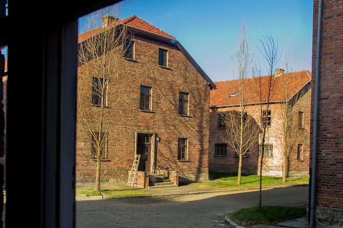 Auschwitz Birkenau Guided Tour Small Group with Hotel Pick up - Walking, clothing, bags, and the emotional weight