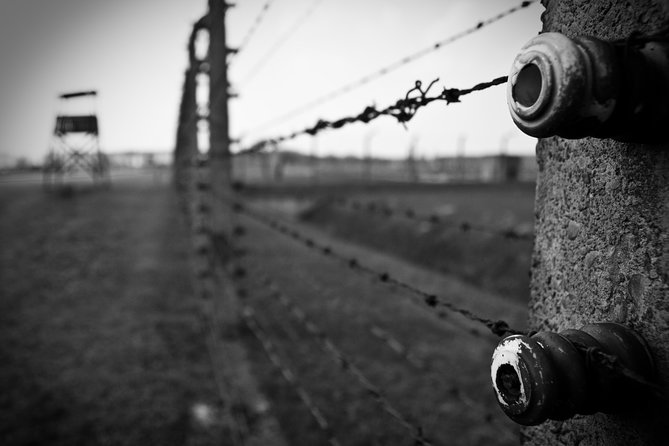 Auschwitz-Birkenau Memorial Entrance Ticket and Guided Tour - Entering Auschwitz I through Arbeit Macht Frei