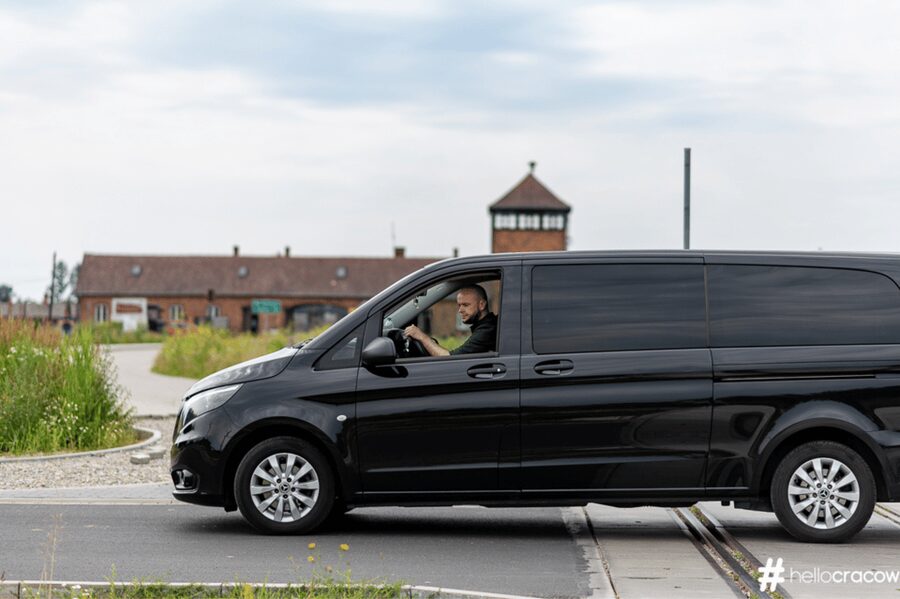 From Krakow: Auschwitz-Birkenau Guided Tour Guaranteed Time - Auschwitz I and the gate marked Arbeit macht frei