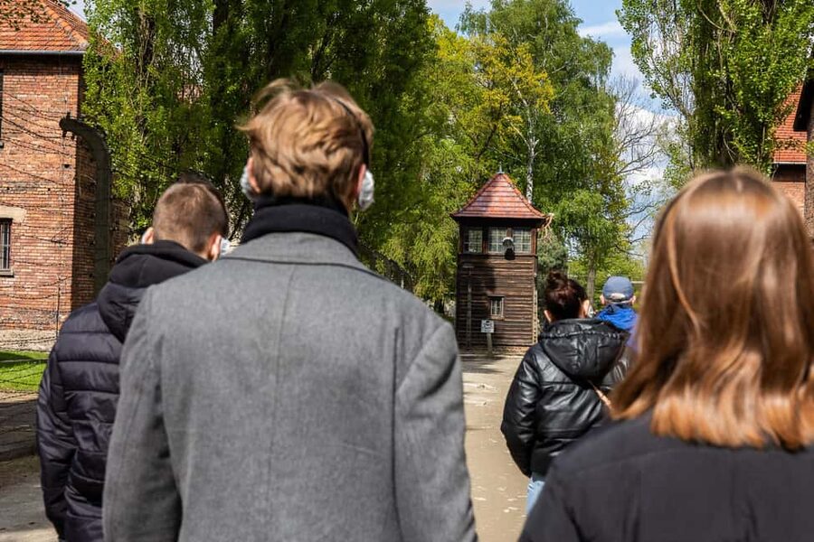 From Krakow: Auschwitz & Birkenau Guided Tour with Pick up - Wooden barracks and daily prisoner conditions