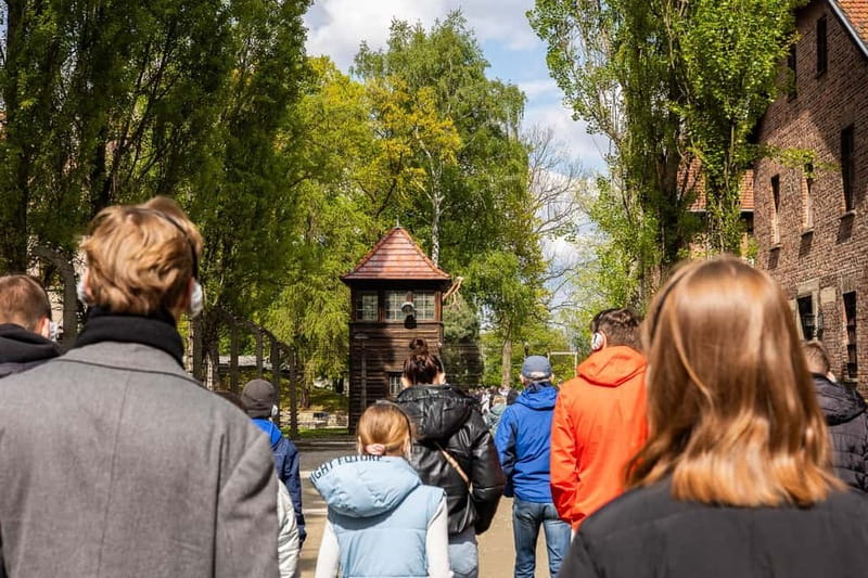 From Krakow: Auschwitz-Birkenau Guided Tour with Transport - Meeting in central Krakow