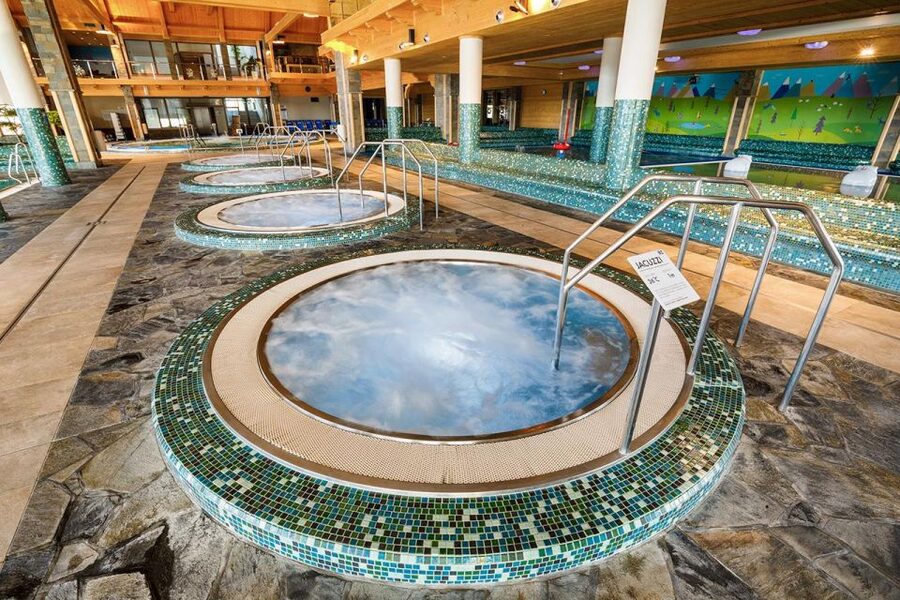 From Krakow: Chochołowskie Thermal Baths Ticket and Transfer - Family Attractions and Water Slides