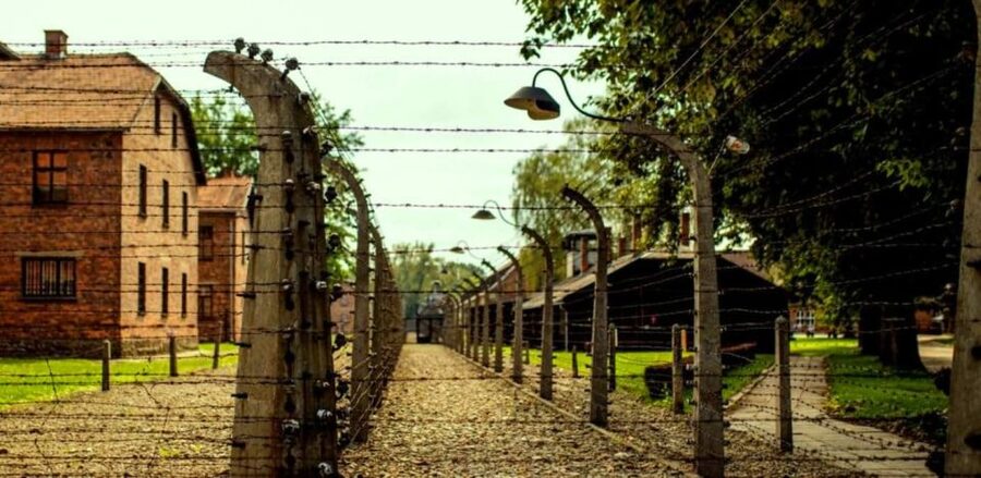 From Krakow: Guided Auschwitz-Birkenau Group Tour by Minivan - Auschwitz I and the Arbeit Macht Frei gate