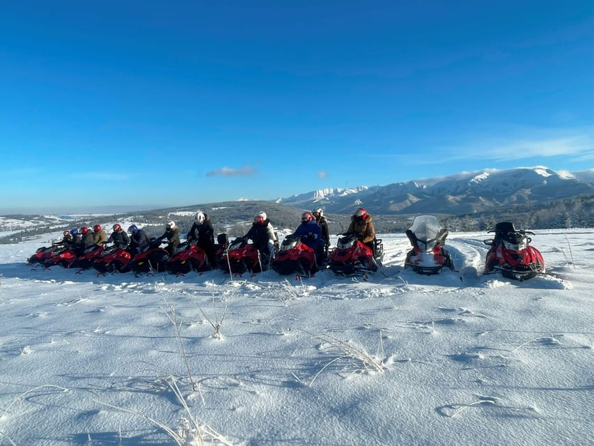From Krakow: Zakopane Snowmobile NIGHT Ride, Bonfire, - Oscypek, mulled wine, and the fire