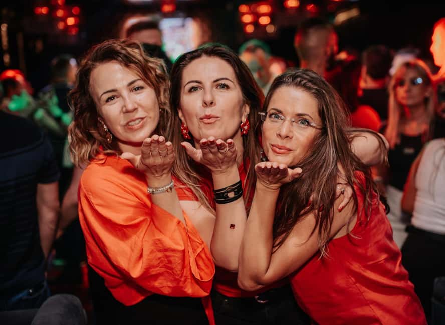 Fun explorers pub Crawl with 1 hour open bar and 3 VIP clubs - Moving through Krakow’s Old Town at night