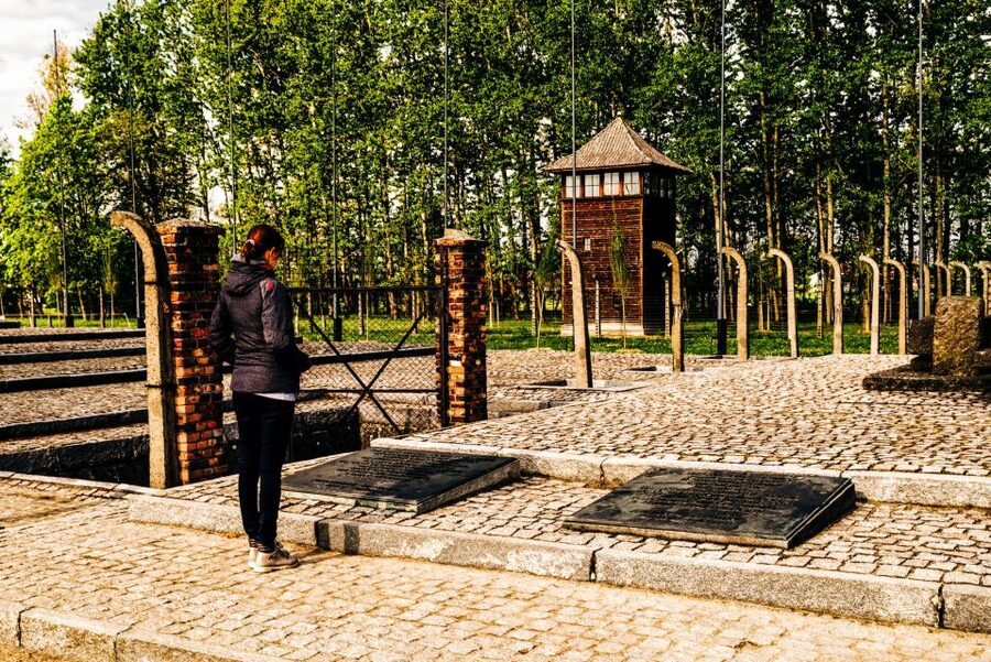 Krakow: Auschwitz-Birkenau Live Guided Tour & Hotel Pickup - The documentary sets the tone