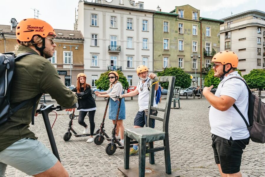 Krakow: Guided E-Scooter City Tour with Food Tastings - Wawel Castle and the dragon beside the Vistula