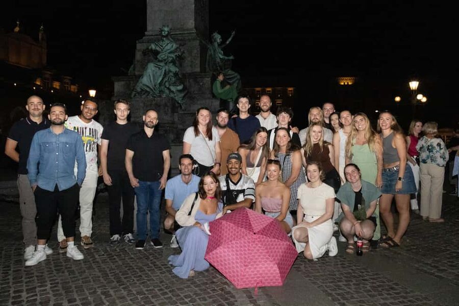Krakow: Pub Crawl with Shots, Drinks & Skip-the-Line Entry - Starting beneath Adam Mickiewicz Monument