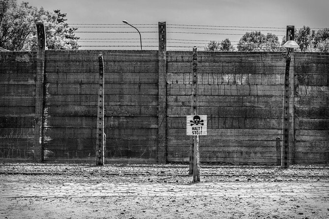 Krakow to Auschwitz-Birkenau Live Guided Tour & Hotel Pick-up - Auschwitz I and the gate marked Arbeit Macht Frei