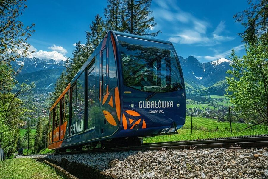 Krakow: Zakopane, Thermal Springs, Cable Car, Local Tasting - Chochołów and its wooden highlander homes